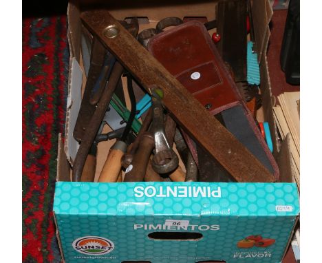 A box of various hand tools and gardening tools, including shears, saws, file, spanners, wrenches etc.