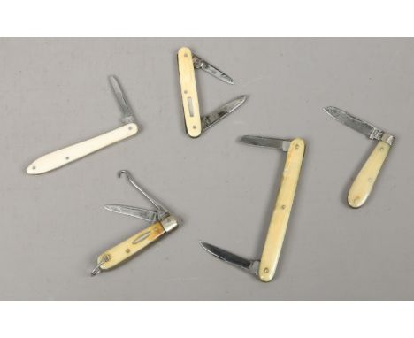 Five Victorian and early 20th century ivory mounted folding pocket knives including multi tool and two single bolstered examp
