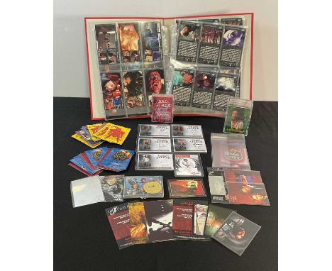 A mixed collection of trading cards, including X-Files, Lord of the Rings, The Black Hole, Legend of the Seeker autograph car