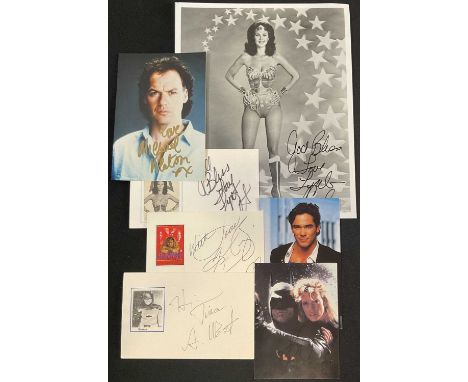 SUPERHEROES - A group of autographs related to superheroes comprising ADAM WEST and MICHAEL KEATON (Batman), LYNDA CARTER x 2