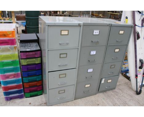 THREE VINTAGE METAL FOUR DRAWER FILING CABINETS 