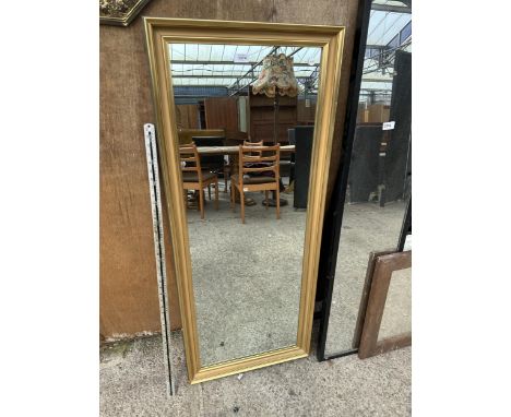 A RECTANGULAR GILT FRAMED MIRROR 