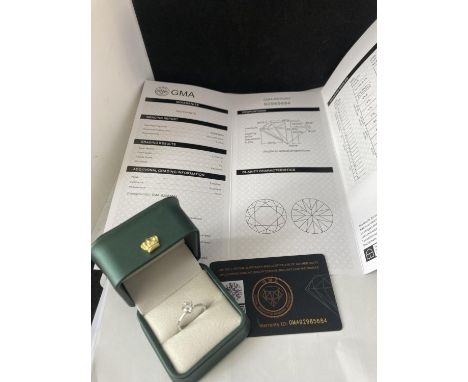 A MARKED 925 RING WITH A ONE CARAT SOLITAIRE MOISSANITE SIZE N/O IN A PRESENTATION BOX WITH A GMA CERTIFICATE 