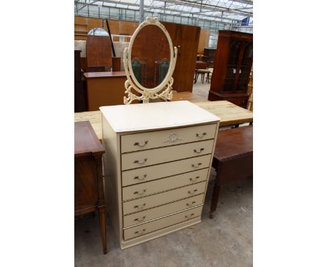 A MODERN CREAM AND GILT DRESSING CHEST WITH SEVEN DRAWERS AND SWING MIRROR, 31" WIDE 