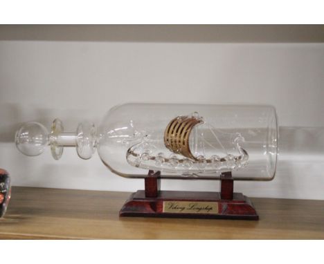A GLASS MODEL OF A VIKING LONGSHIP IN A BOTTLE 
