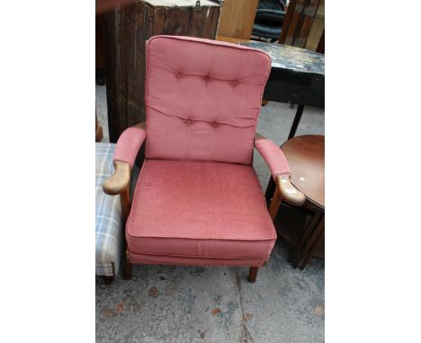 A PARKER KNOLL FIRESIDE CHAIR, MODEL NO. P.K.726 