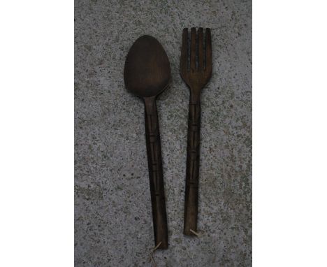 TWO LARGE WOODEN WALL DECORATIONS OF A FORK AND SPOON 