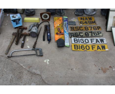 AN ASSORTMENT OF HAND TOOLS AND VINTAGE CAR NUMBER PLATES ETC 