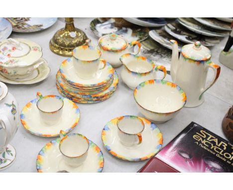 A VINTAGE GRINDLEY, 'CHAMELEON' TEASET TO INCLUDE A TEAPOT, COFFEE POT, SUGAR BOWL, CREAM JUG, CUPS, SAUCERS AND SIDE PLATES 
