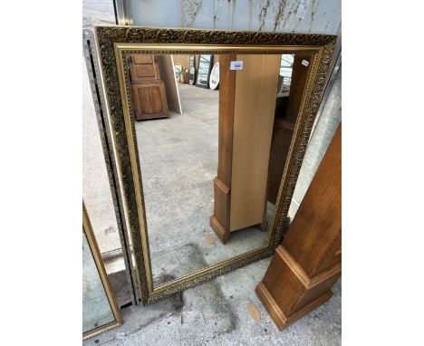 A LARGE RECTANGULAR GILT FRAMED MIRROR 