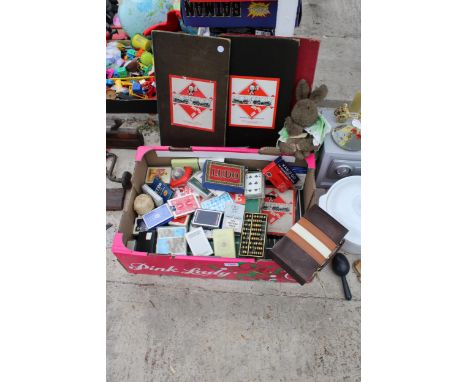 AN ASSORTMENT OF BOARD GAMES AND PLAYING CARDS 