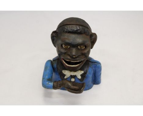 A VINTAGE CAST IRON AFRICAN AMERICAN MECHANICAL BANK 