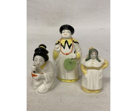 TWO ROYAL WORCESTER MANDARIN CANDLE SNUFFERS TOGETHER WITH A "FRENCH COOK" CANDLE SNUFFER 