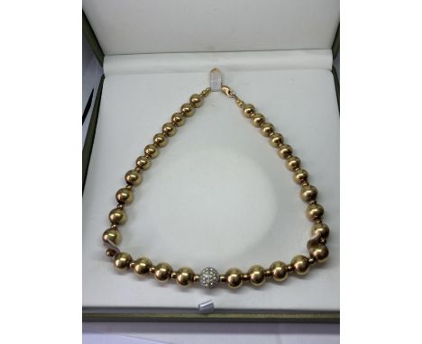 A 1980'S SILVER GILT SPHERE NECKLACE WITH DIAMANTE BALL IN A PRESENTATION BOX 