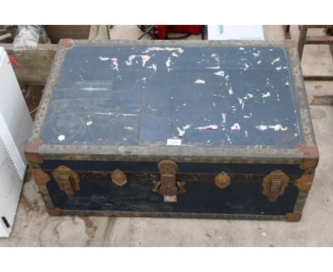 A VINTAGE WOODEN TRAVEL TRUNK 