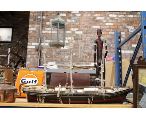 A LARGE WOODEN MODEL OF A SAILING SHIP WITH RIGGING, ETC., - LENGTH APPROX 1 METRE 