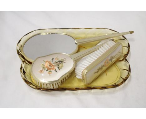 A VINTAGE DRESSING TABLE BRUSH TO INCLUDE, GLAS TRAY, TWO BRUSHES, A MIRROR AND COMB, WITH EMBROIDERED BACKS 