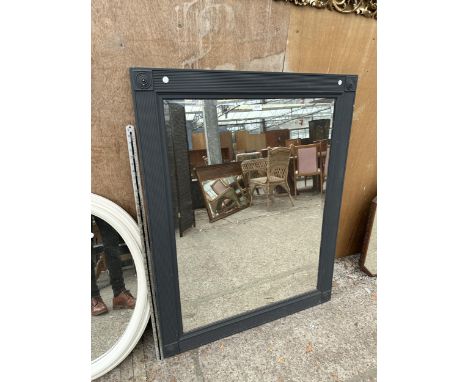 A GREY FRAMED RECTANGULAR MIRROR 