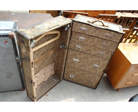 AN EARLY 20TH CENTURY ANTLER LUGGAGE TRAVEL WARDROBE STEAMER TRUNK BEARING VARIOUS TRAVEL LABELS 
