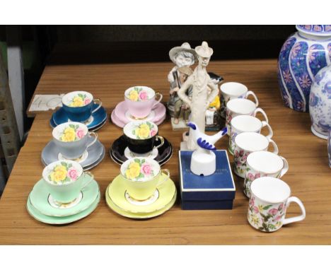 SIX IMPERIAL BONE CHINA TRIOS, SIX CHINA MUGS PLUS FIGURINES AND A BOXED ROYAL WORCESTER PIE FUNNEL 