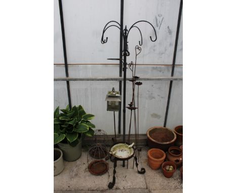 A N ASSORTMENT OF METAL GARDEN ITEMS TO INCLUDE BIRDBATHS, PLANT STAND AND A HANGING LANTERN ETC 