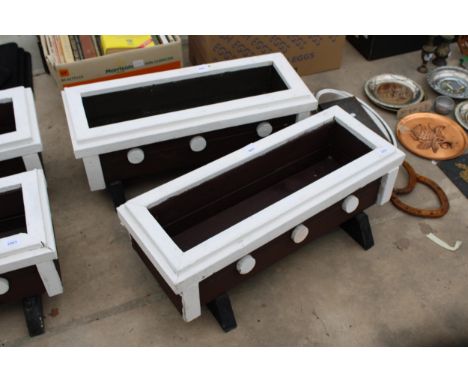 TWO WOODEN PAINTED TROUGH PLANTERS 