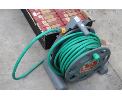 A HOSE REEL WITH HOSE PIPE 