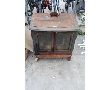 A LARGE VINTAGE HEAVY CAST IRON LOG BURNER 