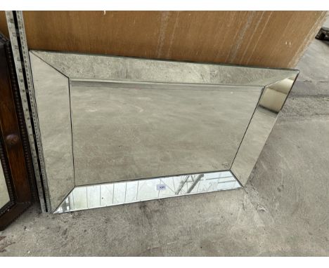 A BEVEL EDGE WALL MIRROR WITH ANGLED SIDE MIRRORS, 31" X 22" 