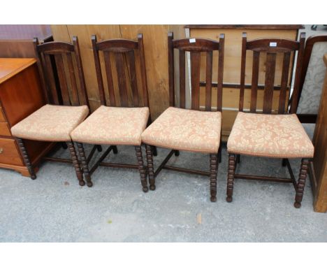 A SET OF FOUR OAK EARLY 20TH CENTURY DINING CHAIRS ON BOBBIN TURNED LEGS 