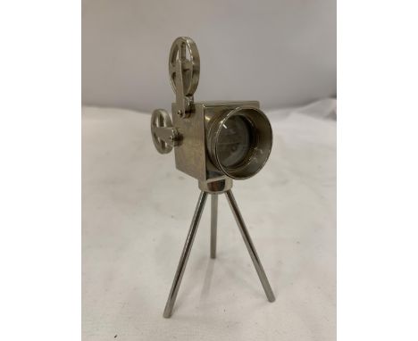 A WHITE METAL MODEL OF A PROJECTOR, HEIGHT 13CM 