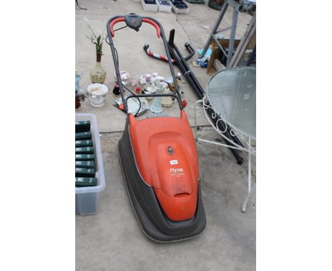 AN ELECTRIC FLYMO TURBO COMPACT 330 LAWN MOWER 