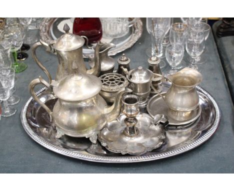 A QUANTITY OF SILVER PLATED ITEMS TO INCLUDE, A TRAY, TEAPOT, COFFEE POT, CANDLESTICK, JUGS, A CRUET SET, SMALL ROSE BOWL, ET