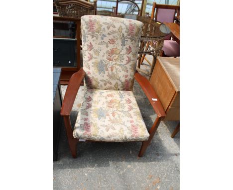 A PARKER KNOLL FIRESIDE CHAIR MODEL NO. P.K.988-1023 