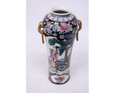 A LARGE POLYCHROME ENAMEL HAND PAINTED CHINESE VASE WITH ELEPHANT HANDLE 