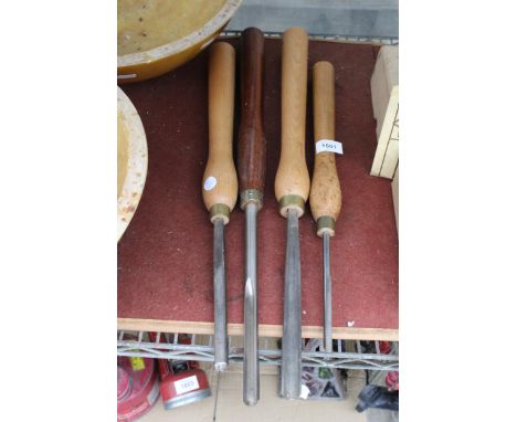 FOUR LARGE WOODEN HANDLED LATHE TOOLS AND CHISELS 