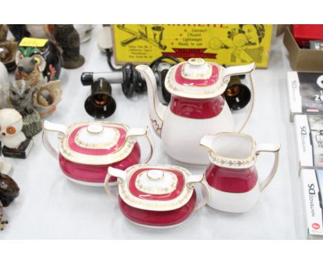 A SPODE BONE CHINA COFFEE SET COMPRISING OF A COFFEE POT, JUG, LIDDED CREAM AND SUGAR 