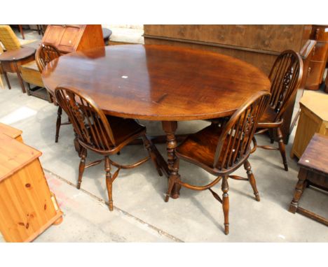 AN OAK GEORGIAN STYLE OVAL DINING TABLE, 72" X 48" ON BOBBIN TURNED LEGS WITH FOUR ELM AND BEECH WHEEL-BACK WINDSOR CHAIRS WI