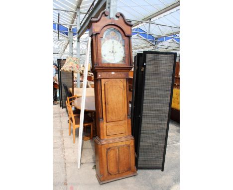 A 19TH CENTURY OAK AND MAHOGANY INLAID EIGHT DAY LONG CASE CLOCK WITH PAINTED ENAMEL DIAL DEPICTING NATIVES AND CLASSICAL LAD