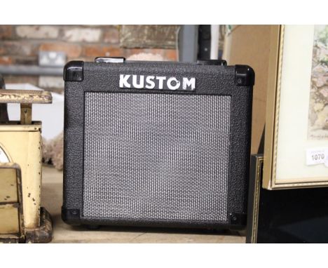 A KUSTOM KGA 10 LEAD GUITAR AMPLIFIER, WORKING AT TIME OF CATALOGUING, NO WARRANTY GIVEN 
