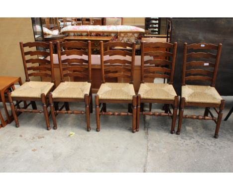 A SET OF FIVE ELM AND BEECH LANCASHIRE STYLE DINING CHAIRS WITH LADDER-BACKS AND RUSH SEATS 