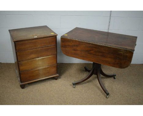 A 20th Century mahogany commode, with hinged rectangular top enclosing a fitted interior, raised on inverted bulb feet, 76 x 