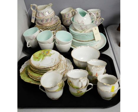 A Foley bone china tea service, decorated with floral sprays, comprising; six tea trios, cream jug, sugar bowl and sandwich p