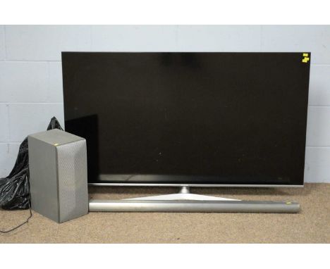 A Hisense LED 55" backlight TV with LG soundbar and speaker.