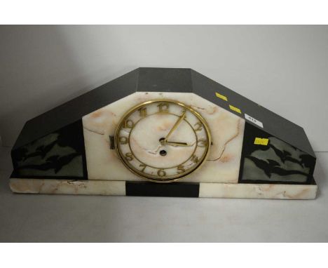 An Art Deco style onyx and marble mantel clock, the domed case with applied brass Arabic chapter ring, measures 20.5cm high x