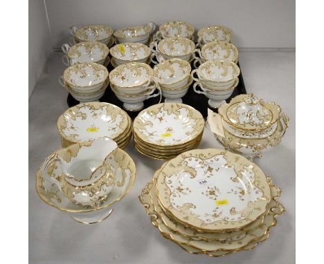 A Victorian part tea service, decorated with cream and gilt foliate borders, on white ground, including: twenty-four cups, tw