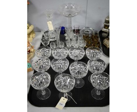 A selection of glassware, including: Baccarat clear glass candlestick, 23cms high; wine glasses; liqueur glasses; and other i