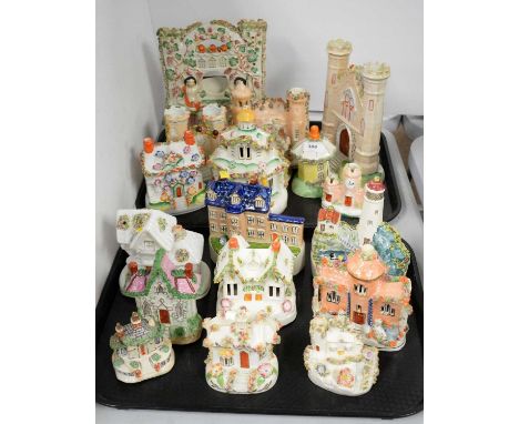 A selection of Staffordshire ceramic pastille burners, of various sizes and designs, most architectural, the largest measurin