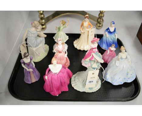 A selection of eleven figures of ladies, including: eight Coalport figures 'Joanne', 'Debutant of the Year', 'The Opera at Gl