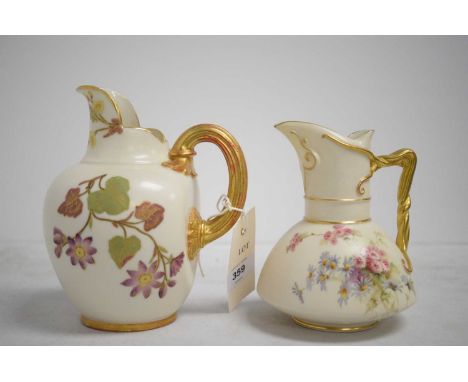 A Royal Worcester floral decorated jug, pattern No. 1394, 16cms high; together with a smaller Royal Worcester jug, pattern No